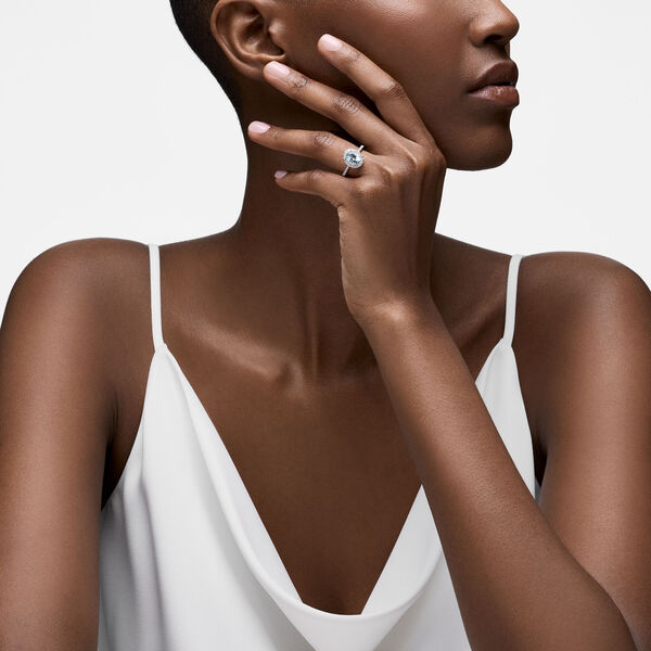 Oval-Cut Aquamarine Ring with Halo and Pav&eacute; Band